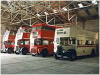 Route Master Buses inside a Warehouse